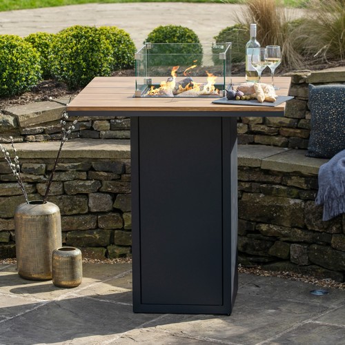Black outdoor fire - pit, table